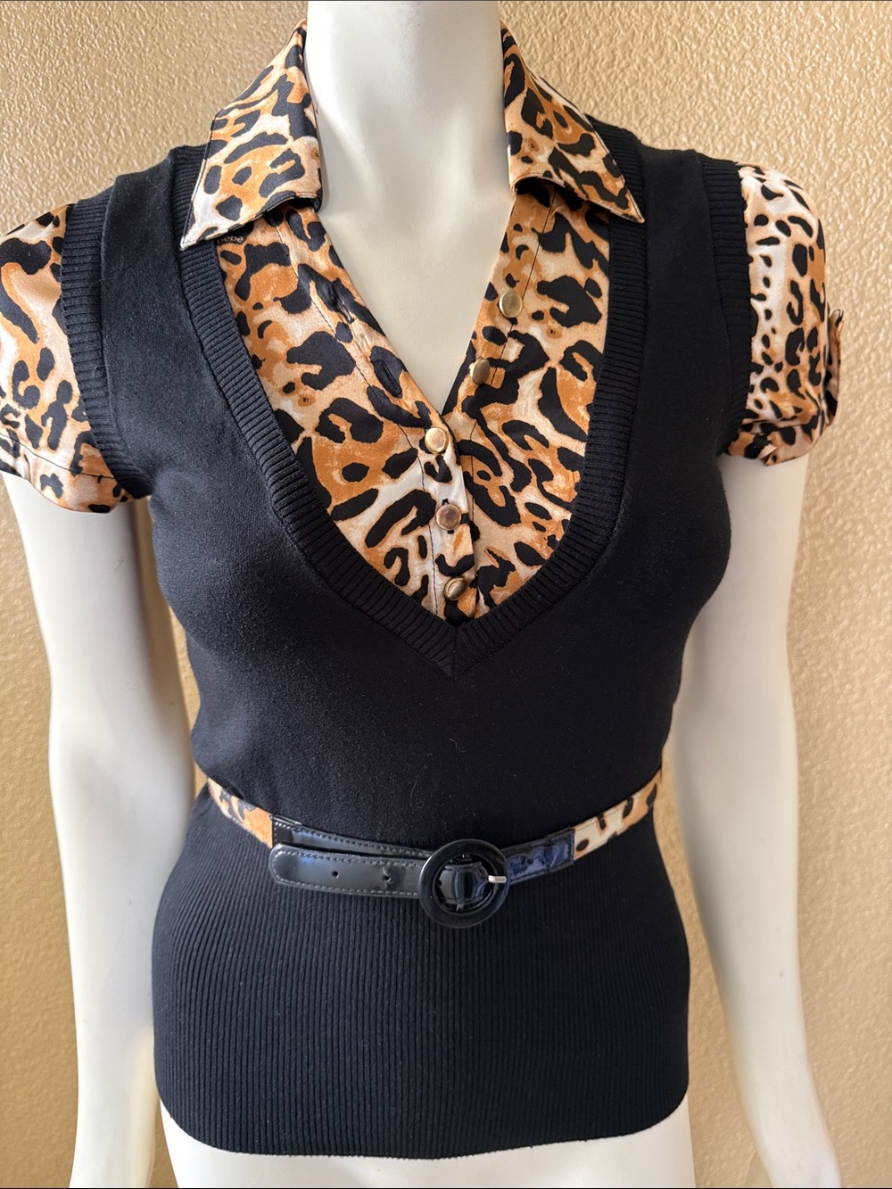 Black Sweater Vest with Leopard Print Blouse Layered